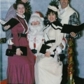 Victorian carollers with Santa